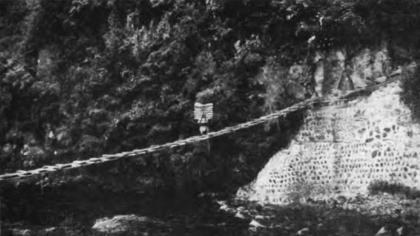 TEA-COOLIE CROSSING A SUSPENSION BRIDGE